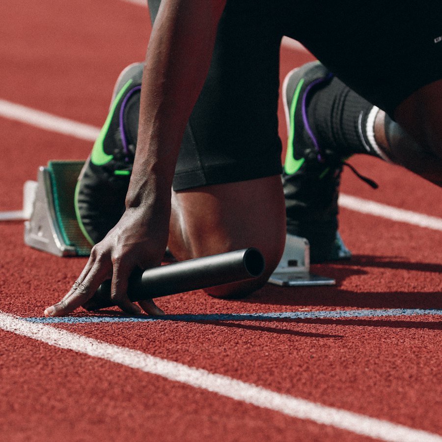 Sprinter leaving the starting blocks on a running track
