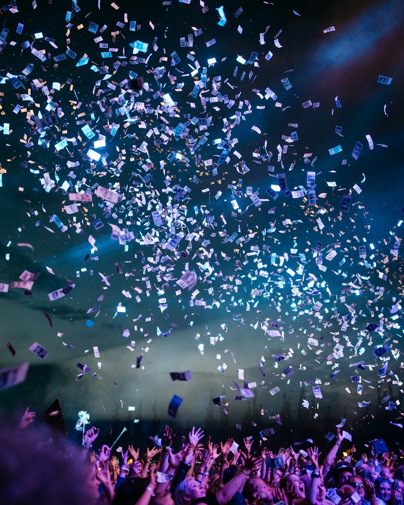 Lights and confetti over the crowd at a music tribute awards night