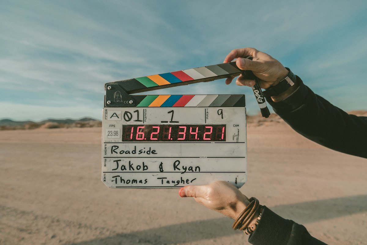 Film slate on a production set representing creative promotion